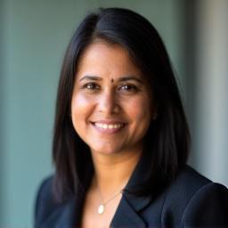 Professional portrait of Maya Singh, Head of Operations at Surakshak Praharak Services